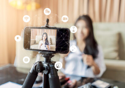 Asian,Businesswoman,Working,From,Home,Live,Video,Interaction,With,Customers